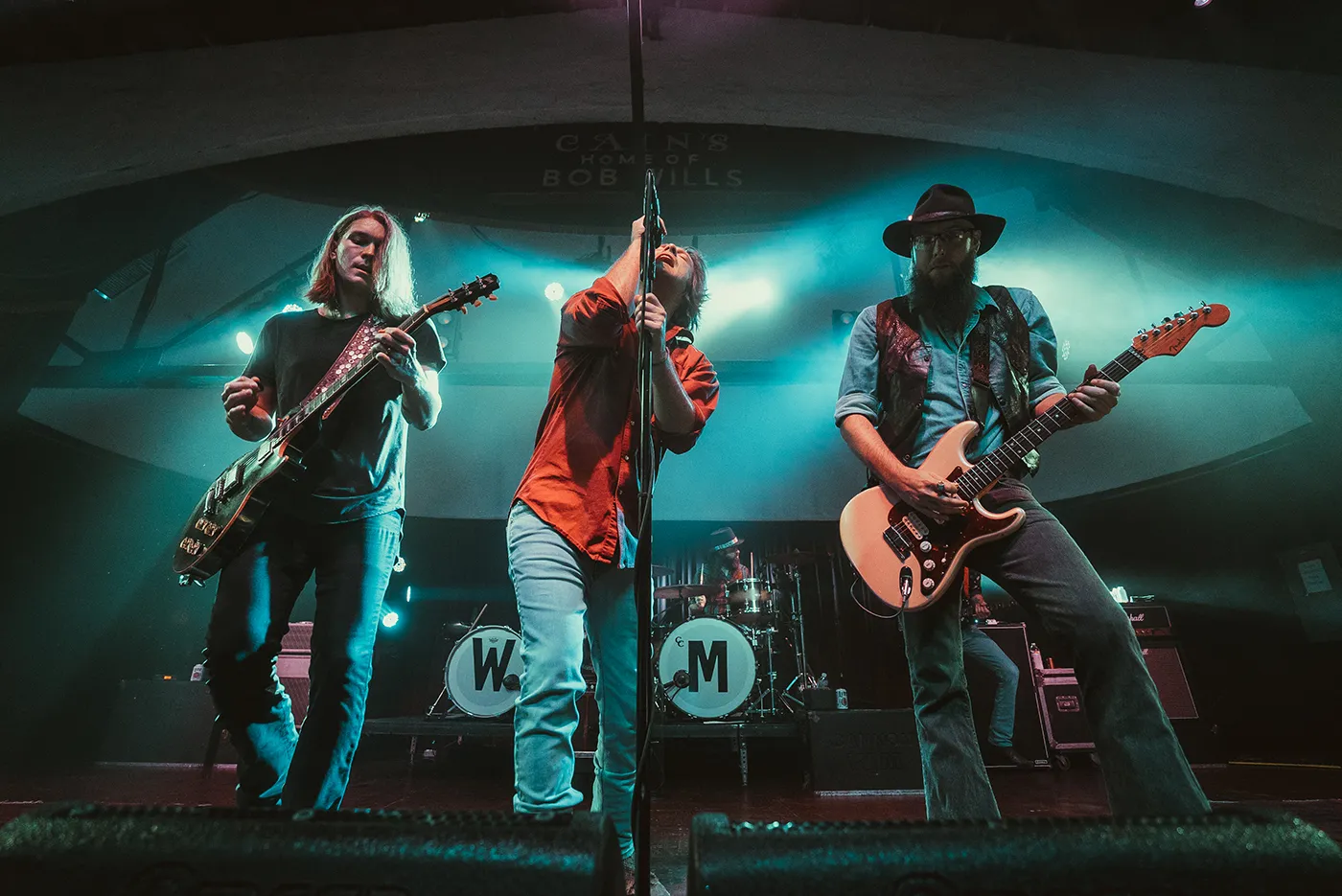 Whiskey Myers performing live with a guitar